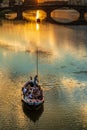 FIRENZE, ITALY - Jun 03, 2019: Renaiolo on the Arno river at sunset Royalty Free Stock Photo