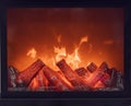 Fireplace with bright flames. Artificial decorative fireplace with imitation of fire. Modern home comfort technology Royalty Free Stock Photo