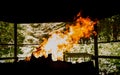 Fireplace with the burning fire in the nature. Royalty Free Stock Photo