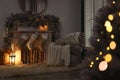 Fireplace with Christmas stockings in room interior Royalty Free Stock Photo