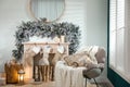 Fireplace with Christmas stockings in room interior Royalty Free Stock Photo