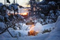 Fireplace and coffee pot in Finland. There is a sunset in the background.