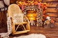 Fireplace collected from logs, rocking-chair and furs Royalty Free Stock Photo