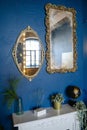 Fireplace design in the apartment large antique mirrors