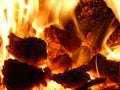 Fireplace - Hot Flames of Burning Coal Lumps and Heat Royalty Free Stock Photo