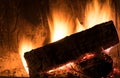 Fireplace inside home burning wood Royalty Free Stock Photo