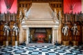 A fireplace and knight armor inside of Great Hall in Edinburgh Castle