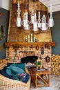 fireplace in the living room of the country house. coziness decor in retro style Royalty Free Stock Photo