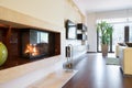 Fireplace at modern apartment Royalty Free Stock Photo