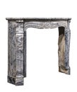 Fireplace surround in grey white marble antique Victorian isolat Royalty Free Stock Photo