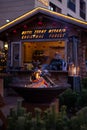 Fireplace at traditional christmas market Christkindlmarkt at Meran Merano, South Tyrol Italy