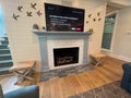 A fireplace and TV in a luxury vacation rental home on Kiawah Island in South Carolina Royalty Free Stock Photo