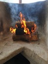 Fireplace with wood fire brning Royalty Free Stock Photo