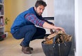 Fireplace, wood and man in home for fire preparation for heat, warmth and light in winter. Flame, burning and person Royalty Free Stock Photo