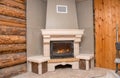 Fireplace in a wooden house