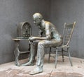 `The Fireside Chat` - Bronze statue of a man listening to radio during great depression