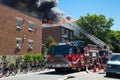 Firetruck and a fire in a a residential building in Montreal