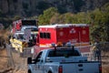 Firetrucks and crews from LACFD and VCFD arrive on scene to fight a brushfire