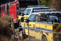 Firetrucks and crews from LACFD and VCFD arrive on scene to fight a brushfire