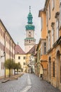 Firewatch Tower with historic street in Sopron, Hungary Royalty Free Stock Photo