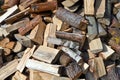 Firewood background - chopped firewood on a stack