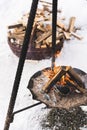 Firewood burning inside the fire-pit during cold winter day Royalty Free Stock Photo