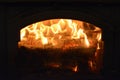 Firewood burns beautifully in the fireplace Royalty Free Stock Photo