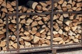 Firewood for kindling the stove in an outdoor cafe. Storage for firewood Royalty Free Stock Photo