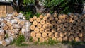 Firewood logs cut and stacked in the springtime to dry outdoors Royalty Free Stock Photo