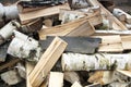 Firewood logs on the ground. Natural background with copy space Royalty Free Stock Photo