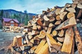 Firewood pile near wooden house