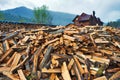 Firewood pile near wooden house