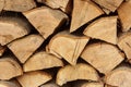 Firewood piles stacked together textured background