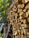 Firewood stack. Cut logs prepared for the winter. Natural wooden background. Wood pile. Royalty Free Stock Photo