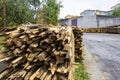 Firewood. Stack of Wood. Heaps of Firewood Near a Natural Wood Wood Processing Factory