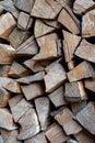 Firewood is stacked one on top of the other. Background texture Royalty Free Stock Photo