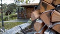 Firewood stacked in a woodpile outdoors in the village. Video. Countryside scenery, close up of chopped tree trunks Royalty Free Stock Photo