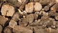 Firewood for winter, stacks of firewood, pile of firewood. Old sawn wood in backyard background Royalty Free Stock Photo