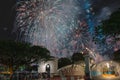 Firework display with people celebrating New Year in downtown Singapore Royalty Free Stock Photo