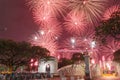 Firework display with people celebrating New Year in downtown Singapore Royalty Free Stock Photo