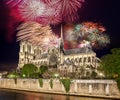 Firework over Notre Dame cathedral in Paris, France