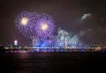 Firework in Riga over the river with bridge