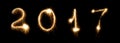 Firework sparkler bright glowing new years eve font lettering number date Royalty Free Stock Photo