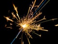 Firework sparkler burning on black background, congratulation greeting party happy new year, christmas celebration