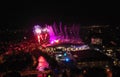 Fireworks above the city, aerial view. Flying during New Year`s Eve, 4th of July celebration, music festival