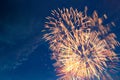 Fireworks on the background of the cloudy night sky. 4th of July - American Independence Day USA Royalty Free Stock Photo