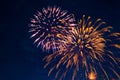 Fireworks on the background of the cloudy night sky. 4th of July - American Independence Day USA Royalty Free Stock Photo