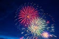 Fireworks on the background of the cloudy night sky. 4th of July - American Independence Day USA