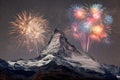 Fireworks behind mountain matterhorn in switzerland representing a national holiday celebration