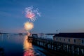 Fireworks on Boothbay Harbor, Maine, reflect off the water on July 4th Royalty Free Stock Photo